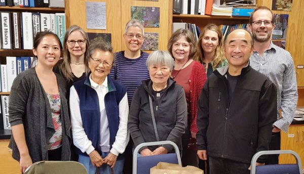 Group photo of members of the Bainbridge Island Japanese American Community and Mission US team members